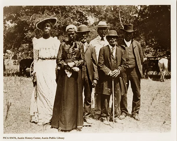 Photo of six people at Juneteenth picnic from Austin History Center. 